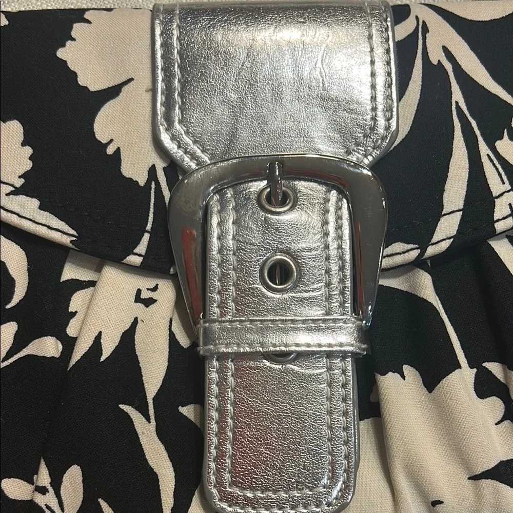 💥 2/$10  White House Black Market Floral Black and White Clutch Silver Strap